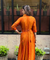 Festive -Rust Orange  Elegant Fusion Patola Printed Drape  Dress